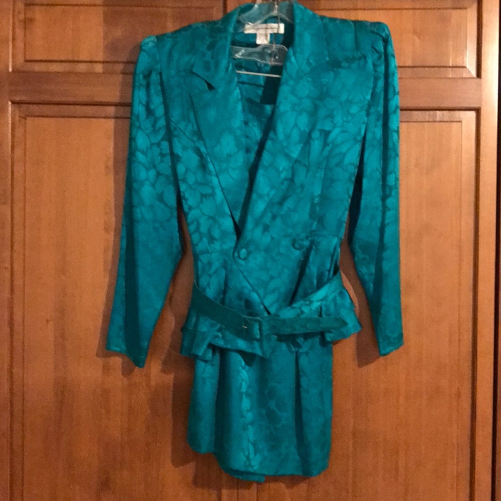 Two piece silk suit with belt.